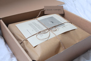 Organic hemp bed set in natural colour. Sustainable, biodegradeable packaging
